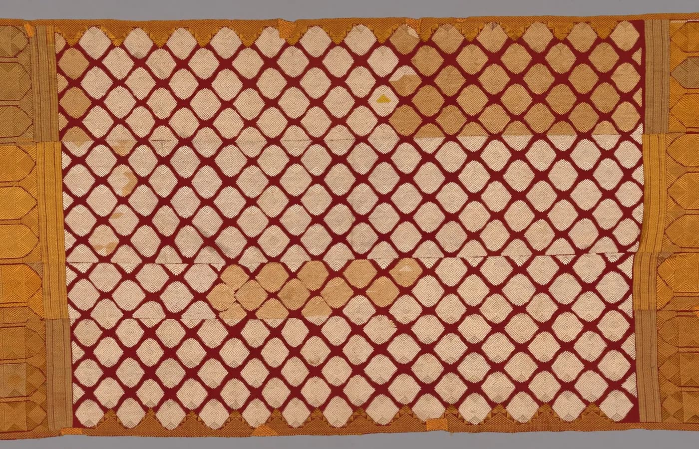 Detailed colourful embroidery on traditional fabric